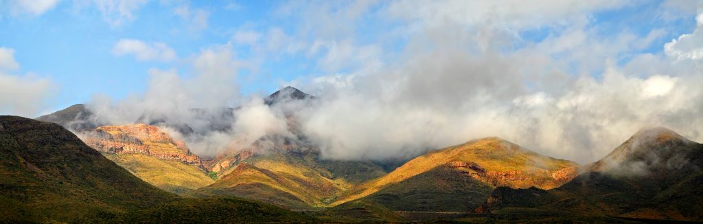 Panoramic view of Castner Range, shrouded in mist.